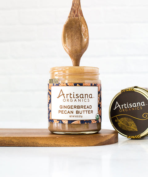 Gingerbread Pecan Butter with spoon dipped inside.