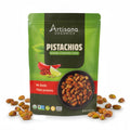 Artisana Organics Smoky Chipotle Lime Pistachios packaging with pistachios around on a white background