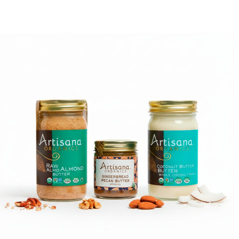 Three jars of Artisana Organics nut butters on a white background: almond, gingerbread, and coconut butters.