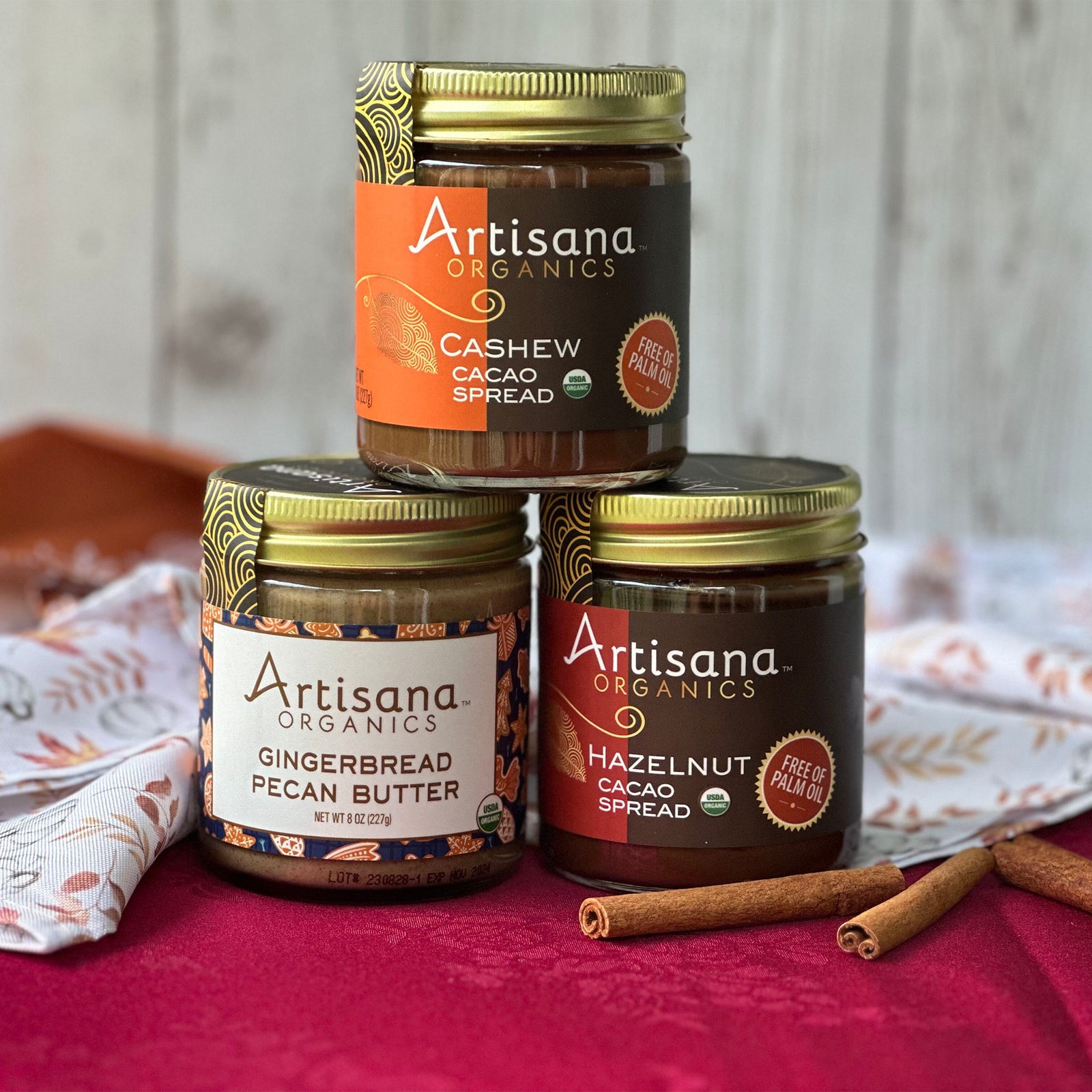 Jars of Cashew Cacao Spread, Gingerbread Pecan Butter, and Hazelnut Cacao SPread